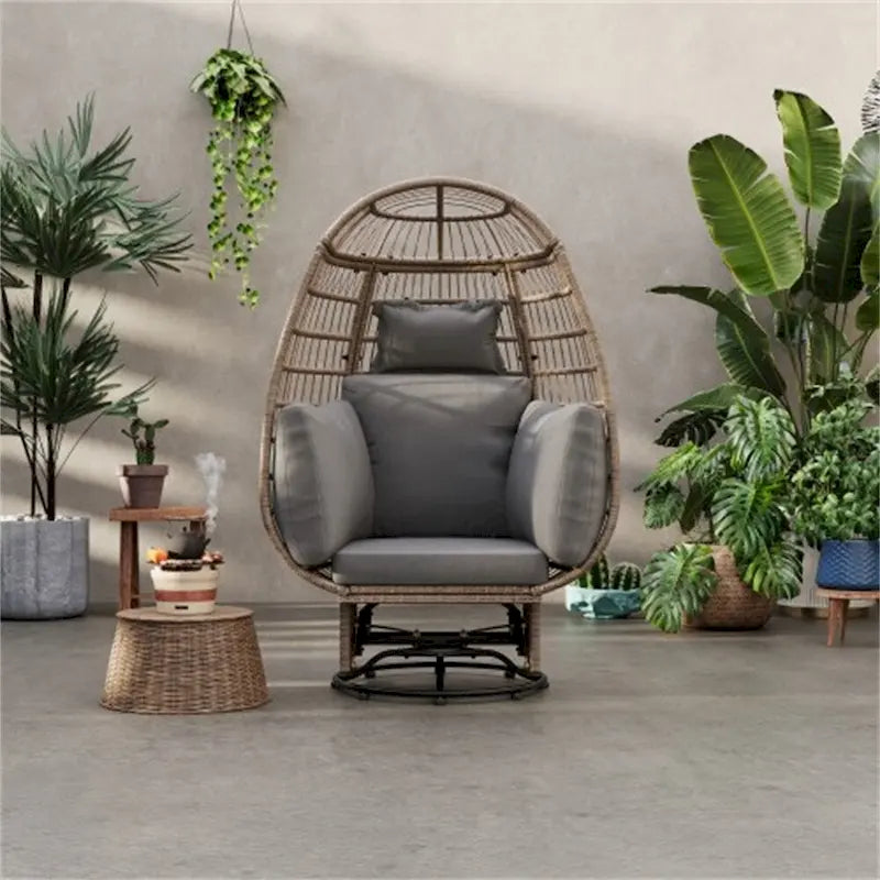 Fauteuil pivotant de jardin en rotin en forme d'œuf avec coussins et fonction bascule