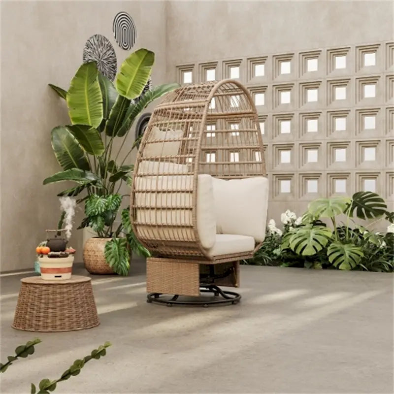 Fauteuil pivotant de jardin en rotin en forme d'œuf avec coussins et fonction bascule
