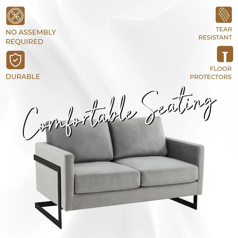 Canapé deux places capitonné en velours avec coussins amovibles et structure en acier inoxydable